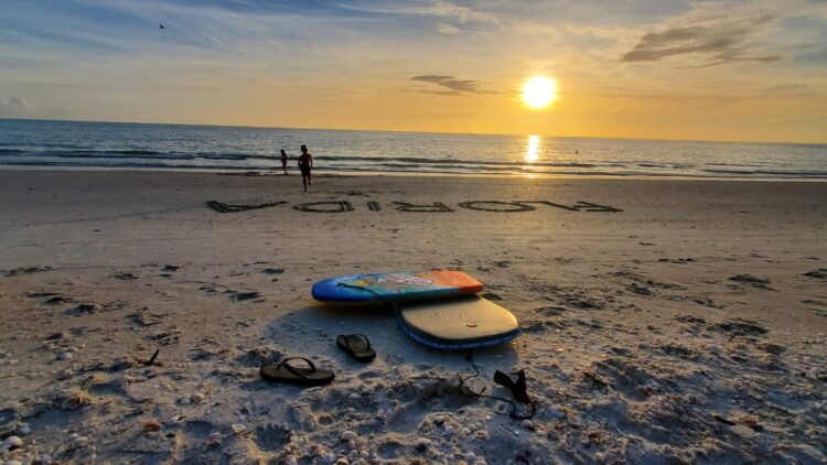 Sunset on a Southwest Florida beach with white sand and Gulf of Mexico