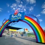 Peppa Pig Theme Park entrance in Florida with colorful rainbow arch