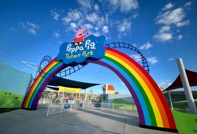 Peppa Pig Theme Park entrance in Florida with colorful rainbow arch